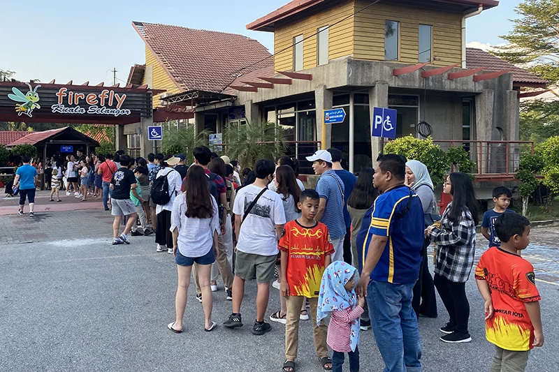 Local tourists queue to buy tickets at Kampung Kuantan Fireflies Park on a busy evening in 2020