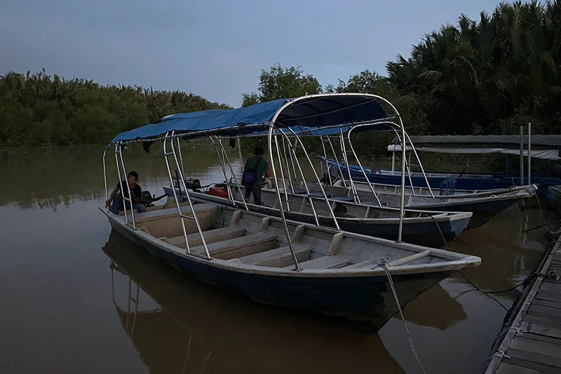 Motorized tour boat docked at Firefly Park Resort in Bukit Belimbing, a popular starting point for the fireflies tour Kuala Selangor