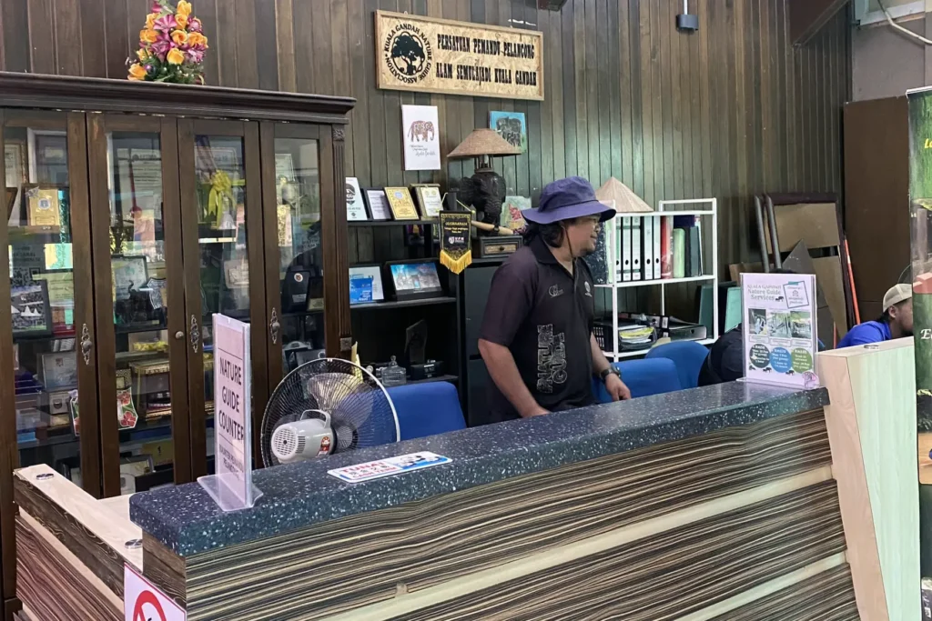 Nature guide counter for registering bathe with baby elephant at Kuala Gandah