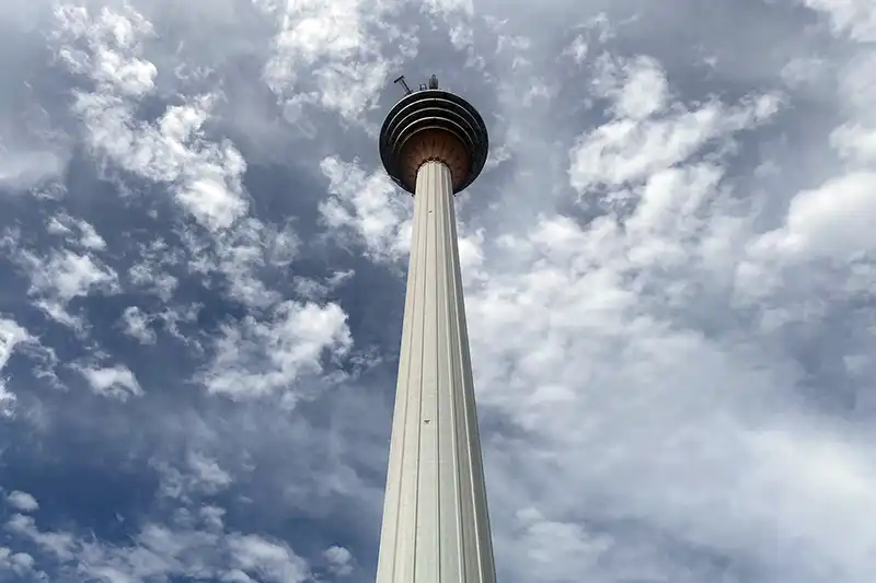 View of KL Tower rising into the sky, one of the most popular attractions in Kuala Lumpur.
Title: KL Tower – Iconic Landmark and City Viewpoint