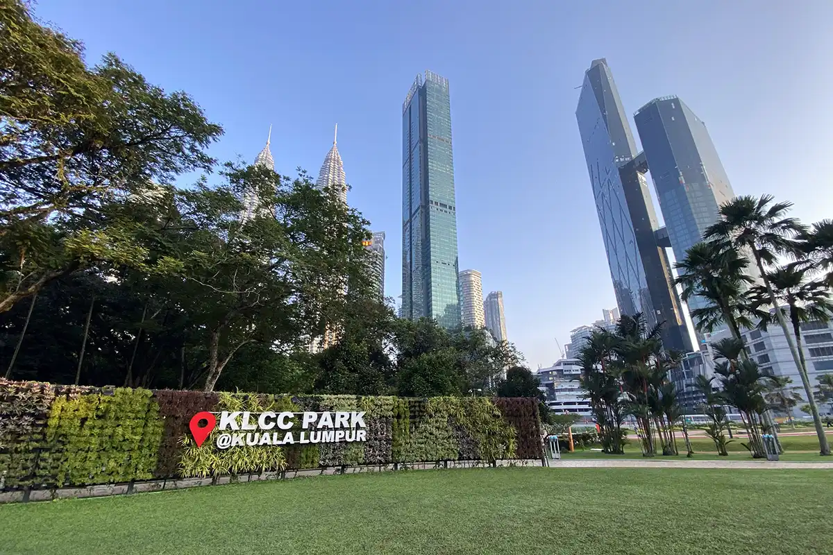 KLCC Park with Kuala Lumpur skyline and Petronas Twin Towers – featured image for Kuala Lumpur Travel Guide.