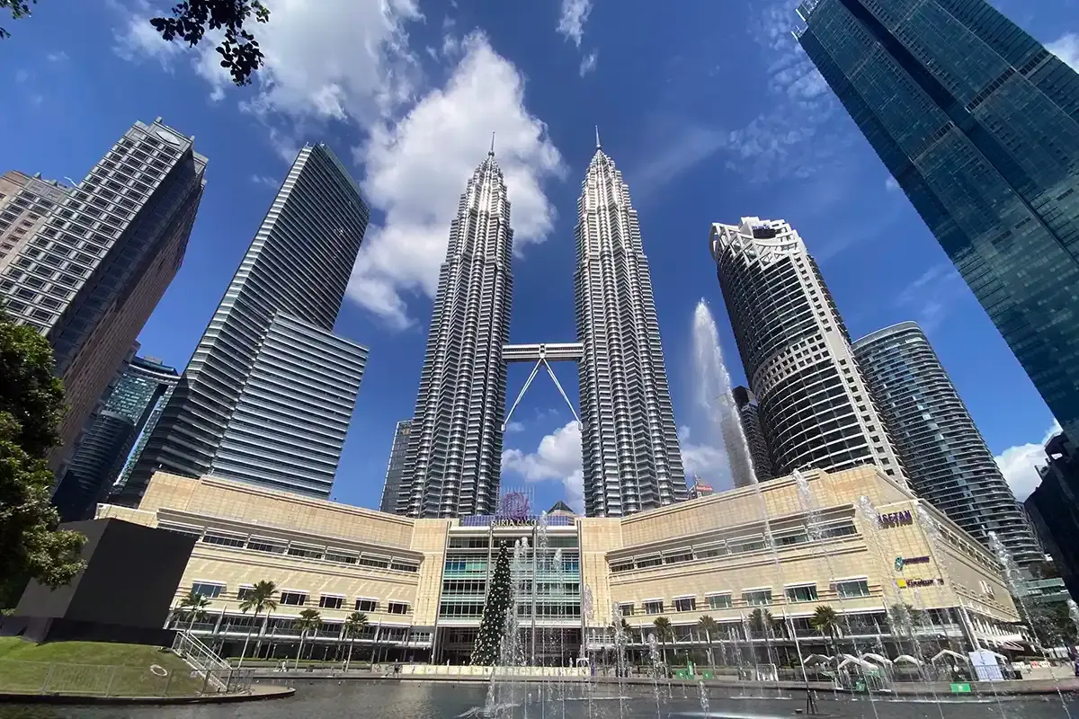 Petronas Twin Towers viewed from KLCC Park, one of the top attractions in Kuala Lumpur for first-time travellers