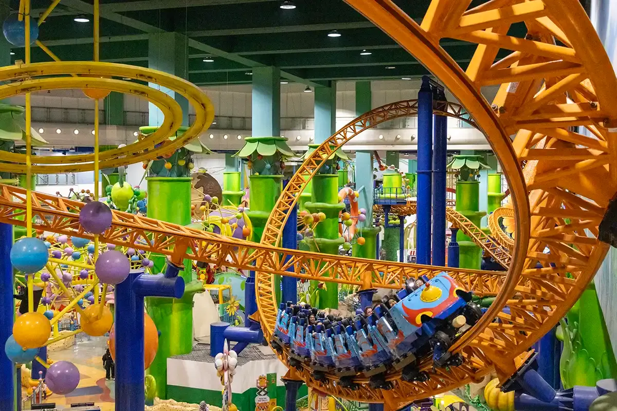 Indoor roller coaster at Berjaya Times Square Theme Park in Kuala Lumpur, showing colourful rides and family-friendly attractions inside one of the city’s largest shopping malls.