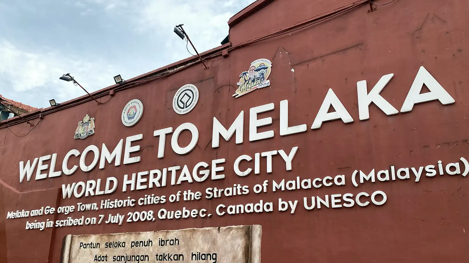 Welcome sign marking Malacca as a UNESCO World Heritage City in Malaysia